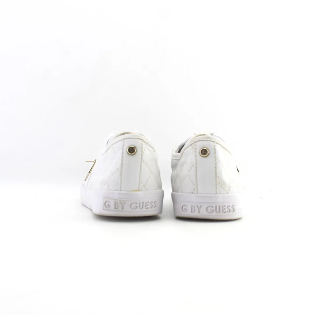 BY GUESS .